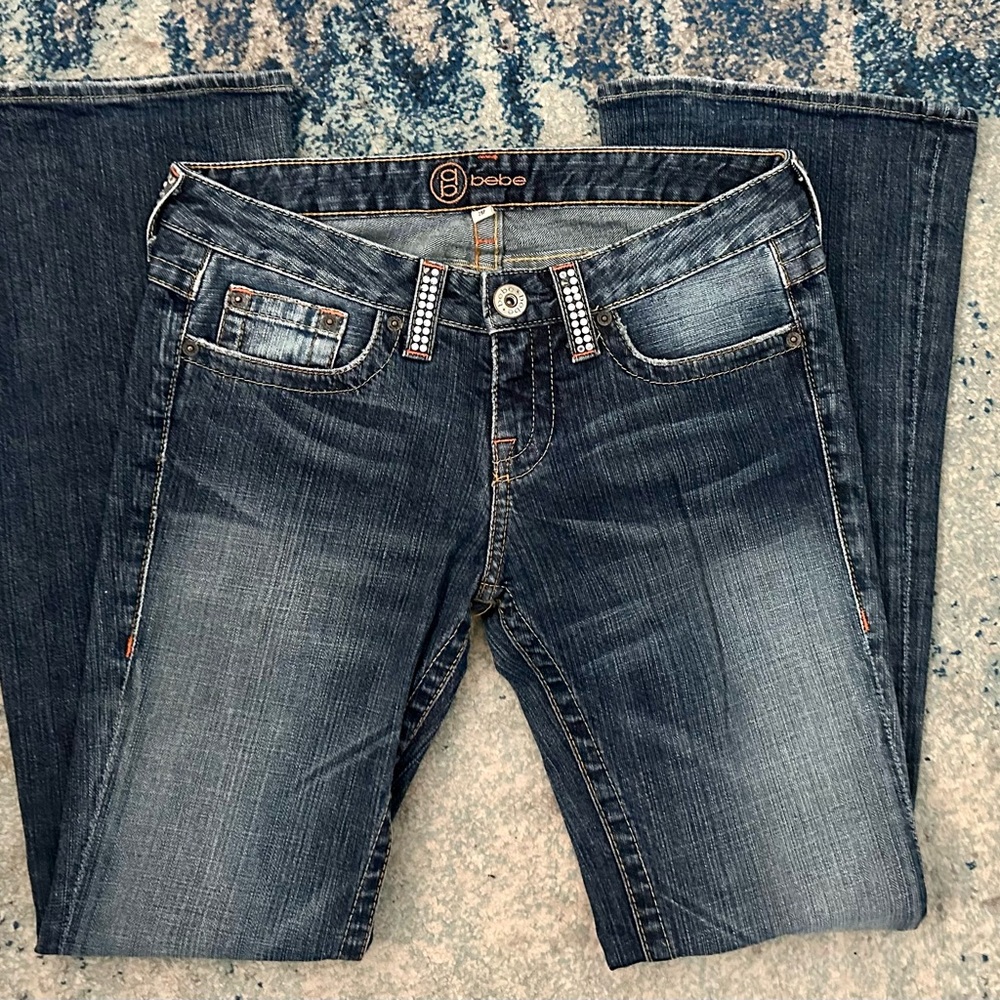 DESIGNED BY BEBE!!!! Fabulous Condition Jeans with decorative pockets